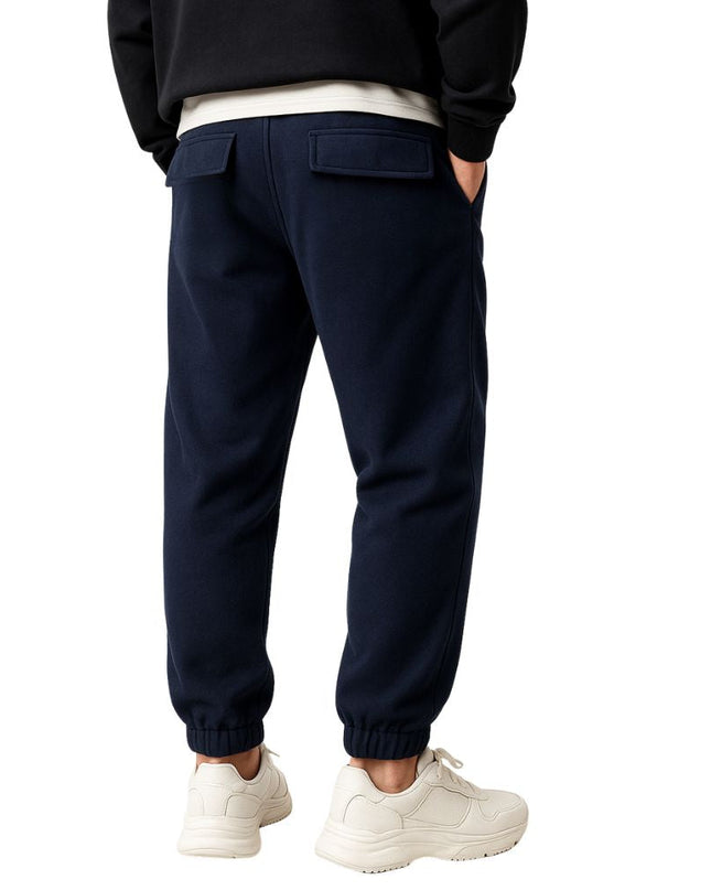 Loose-fitting men's jogging pants with elastic waistband and cuffs
