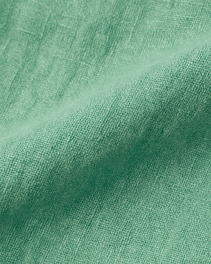 Straight-cut trousers with an elastic waistband and a simple design