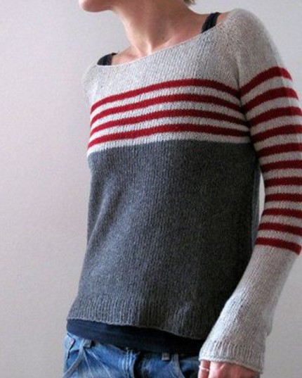 Knitted sweater with striped design