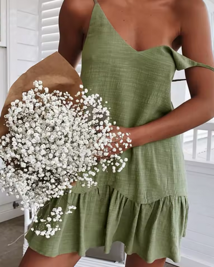 Sleeveless dress with ruffled hemline