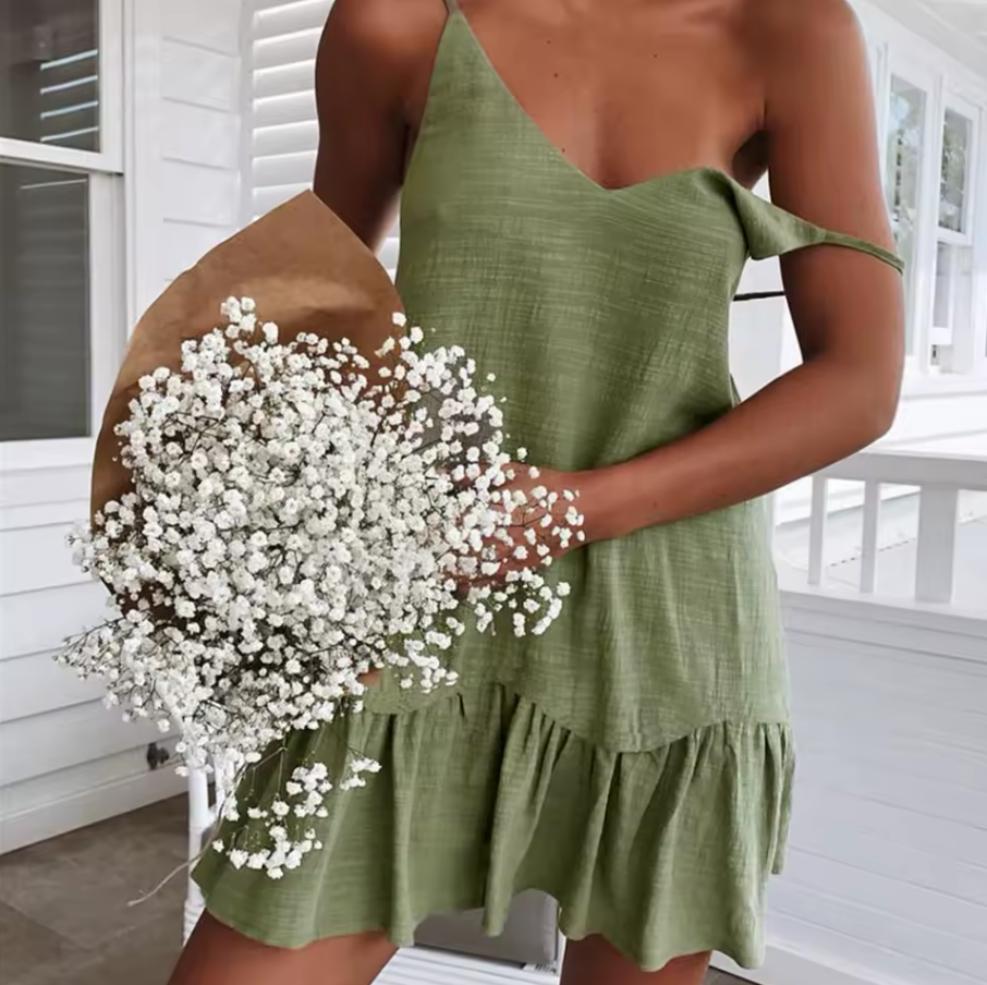 Sleeveless dress with ruffled hemline