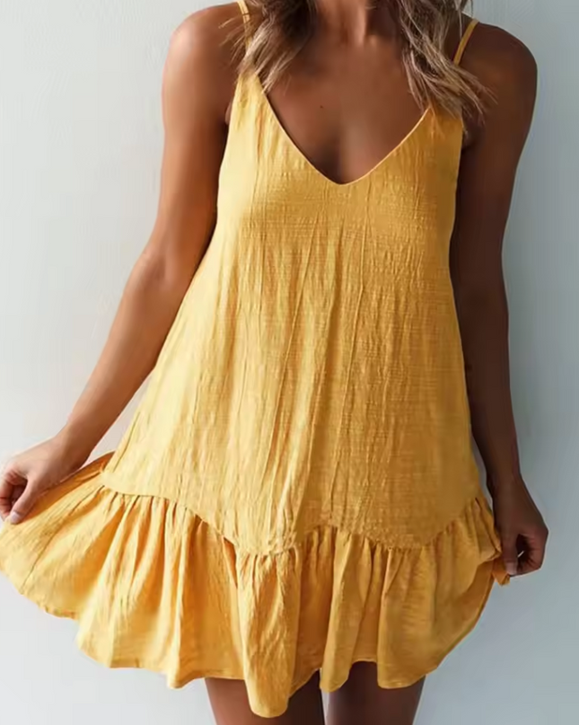Sleeveless dress with ruffled hemline
